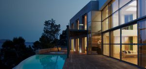 Large picture windows with clear, unobstructed view of outdoor pool